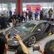 Illustration for article titled Supercars Took Over A Garage To Welcome The $1.9 Million Lamborghini Centenario